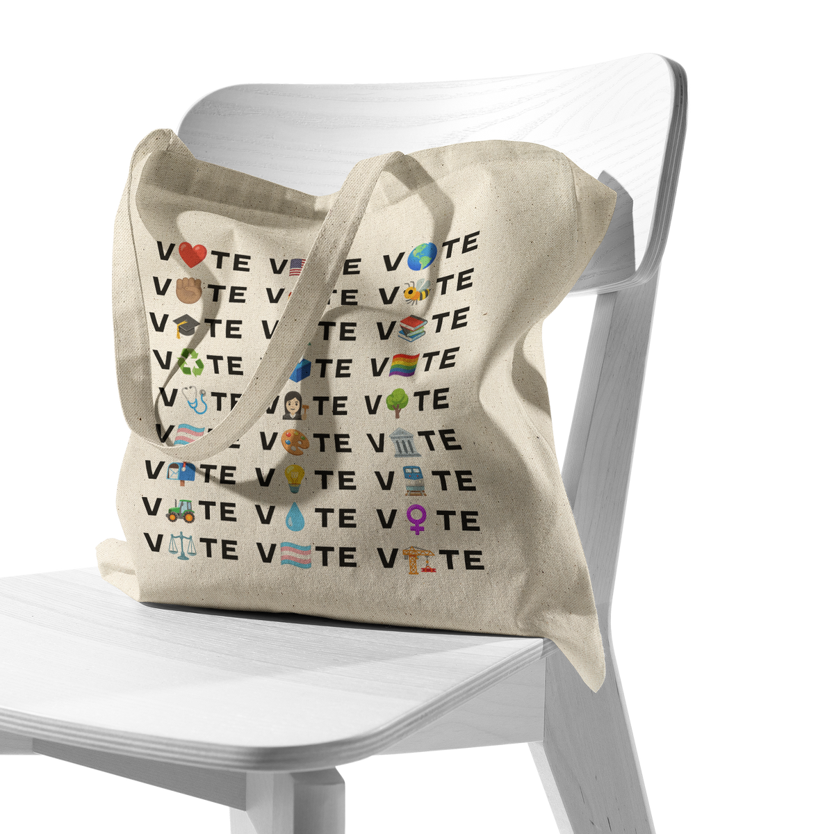 Vote_Emoji_Cotton_Canvas_Tote_Bag_CottonTote_S_Chair_AS_Mockup.png_16480467