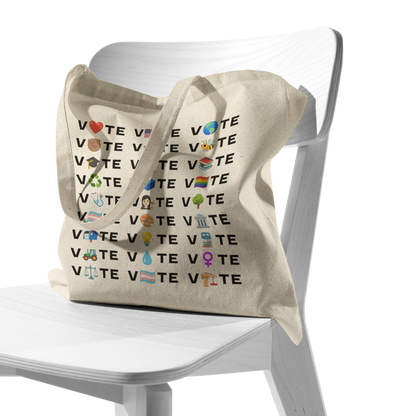 Vote_Emoji_Cotton_Canvas_Tote_Bag_CottonTote_S_Chair_AS_Mockup.png_16480467